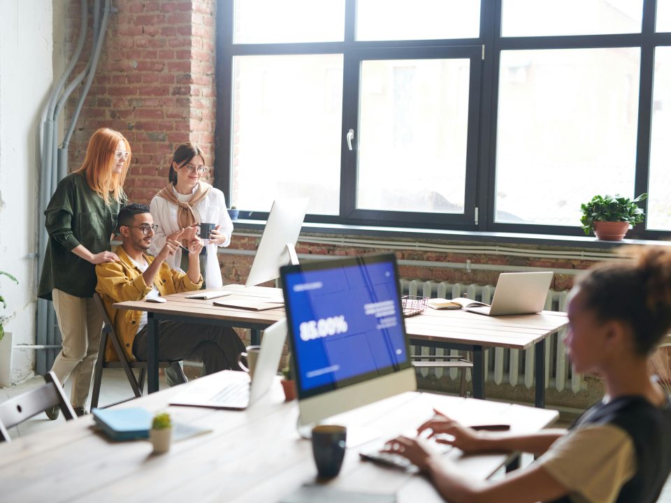 Staff in a busy tech office