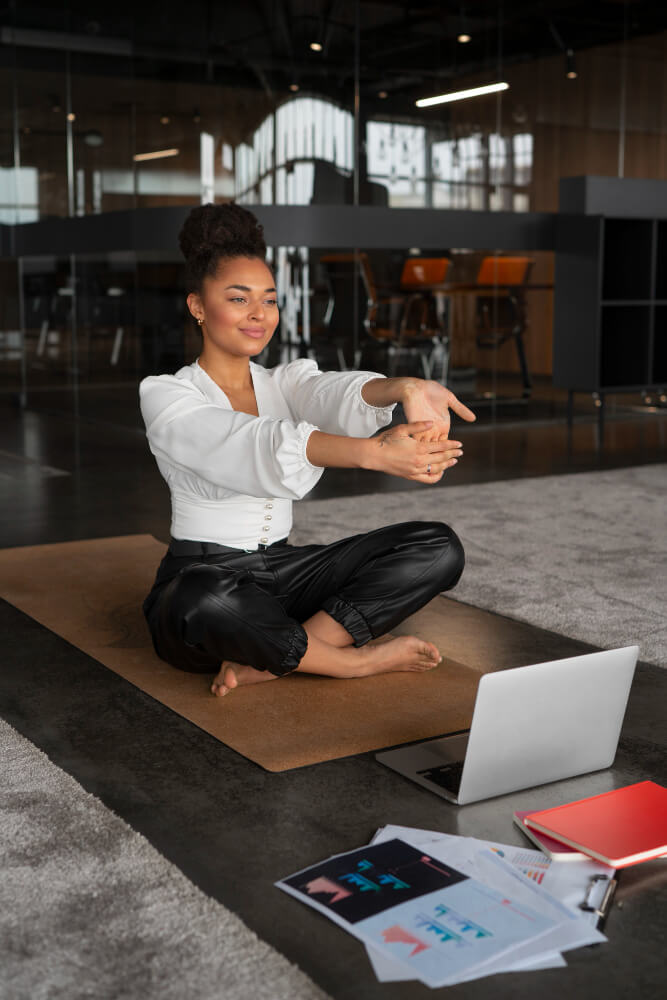Lady doing yoga at work
